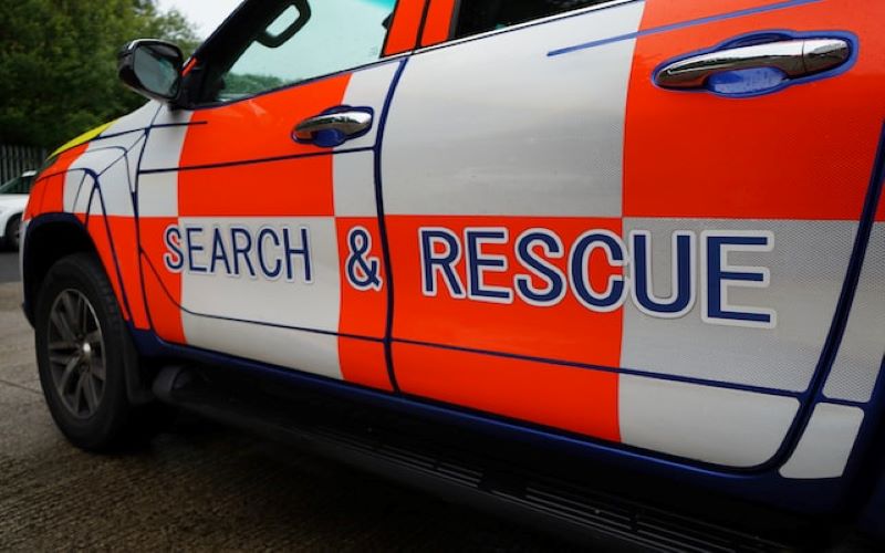 Bright orange and white, search and rescue vehicle.