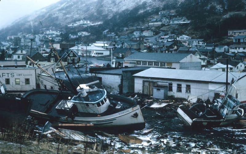 Hurricane Storm Serge in town with fishing boats, logs and other debris blocking streets.